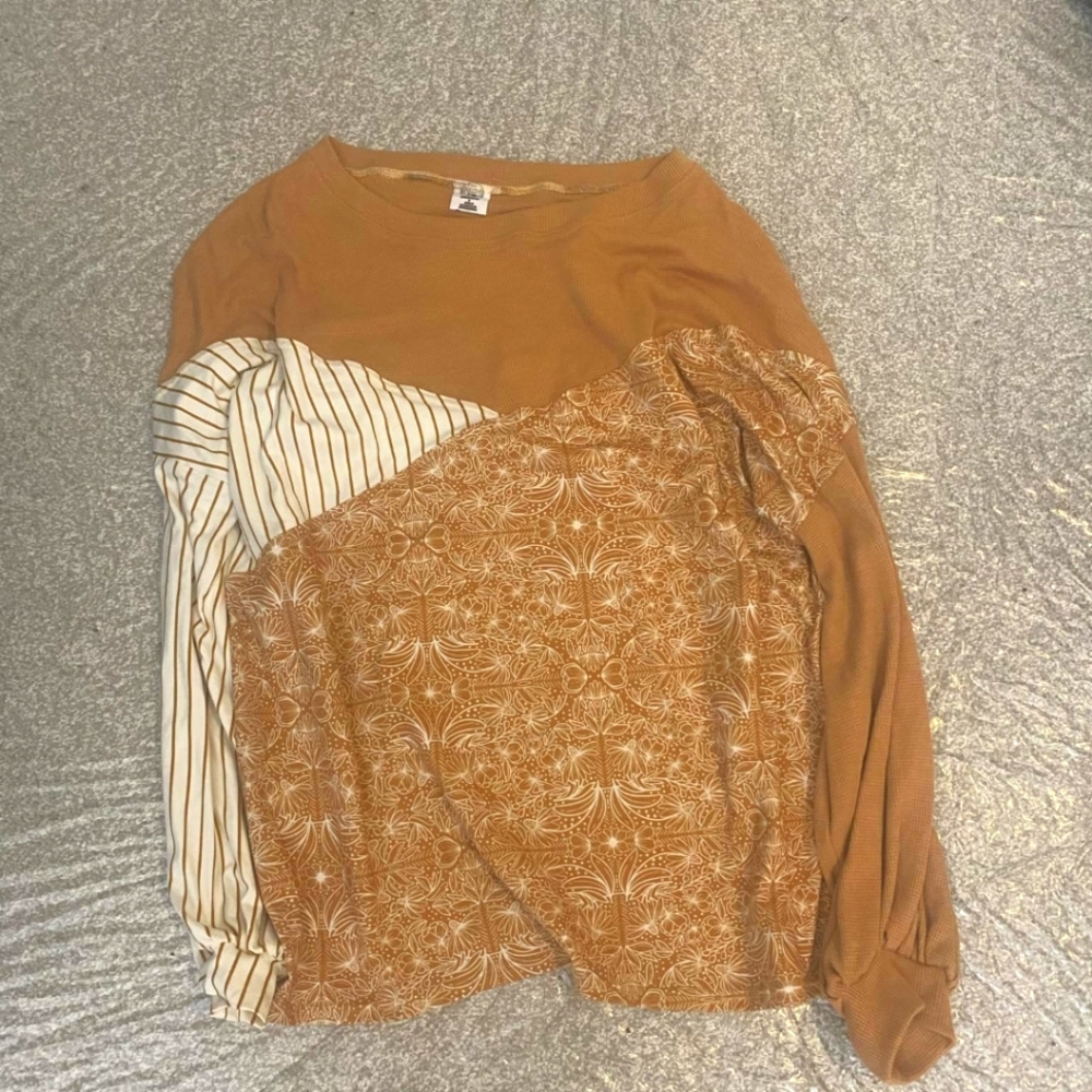 Handmade hand woven brown long-sleeved shirt with a patchwork design featuring L